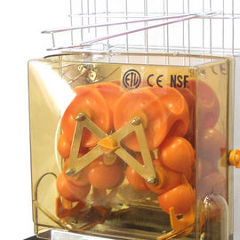 Macchina arancio industriale degli spremiagrumi di verdura e della frutta fresca per l'hotel